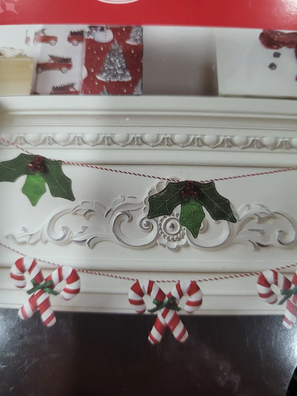 Holiday Time Red and White Candy Cane Garland with Green Bows